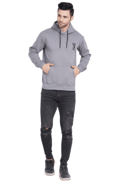 FULL BOD PHOTO OF A GUY WEARING THE SUBTLE GREY HOODIE